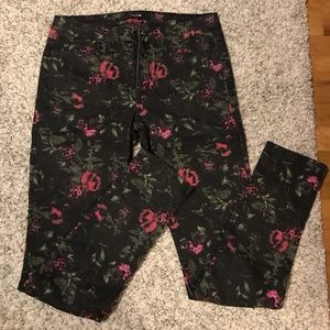 Skinny fit black floral print jeans.